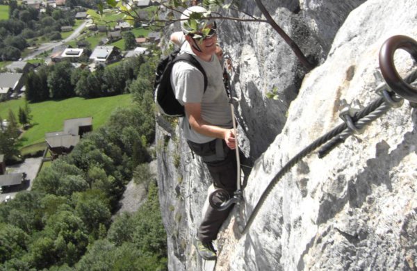Paul Bradley climbing a via-ferrata in France